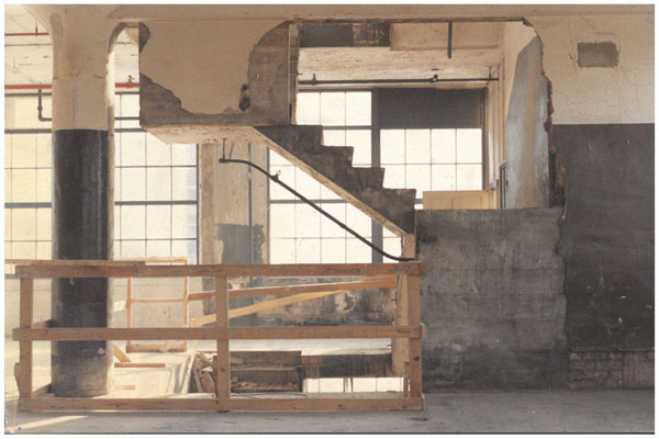A cement staircase under construction.